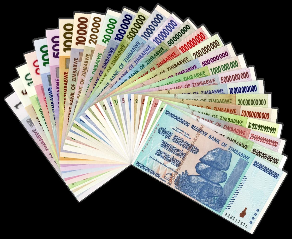 Collection of Zimbabwean dollar banknotes, fanned out, showing various denominations.