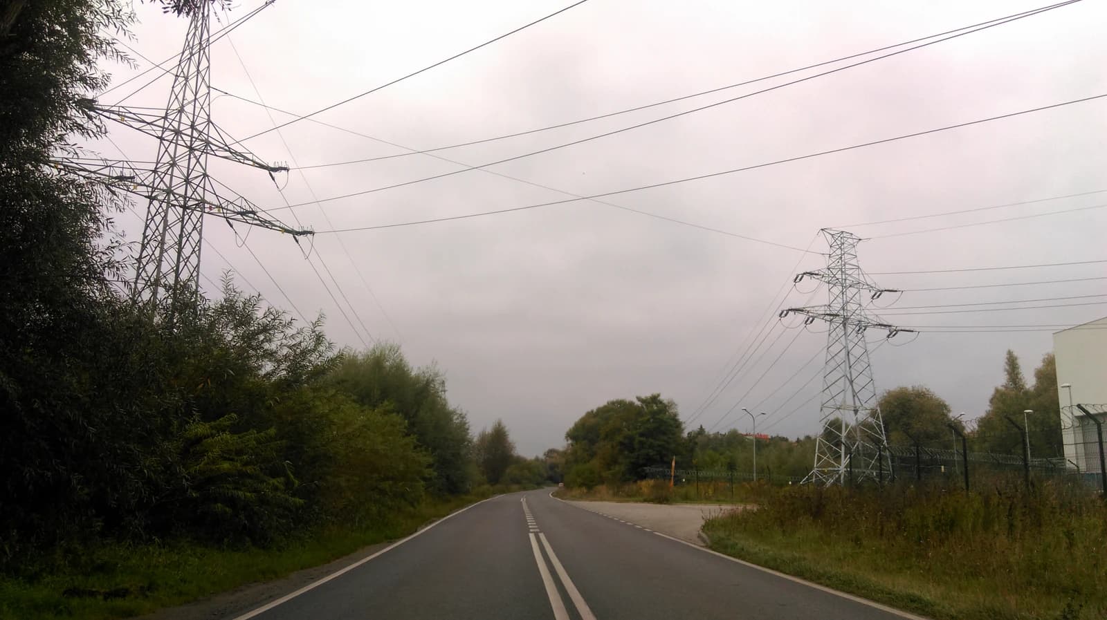 Power lines on metal transmission towers near Szczecin power station in Poland.