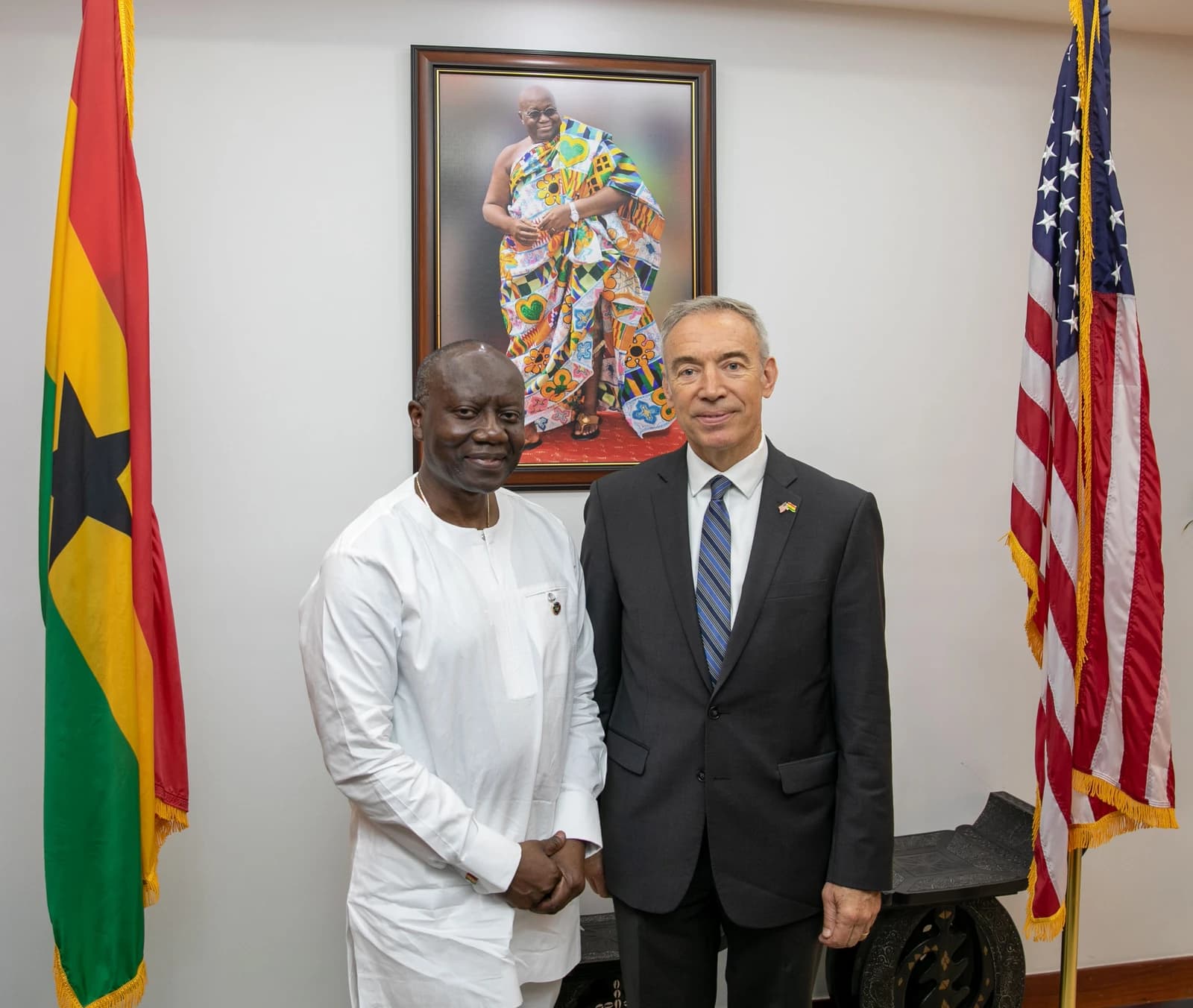 Ken Ofori-Atta, Ghana's Finance Minister, and Stephen Censky, former U.S. Deputy Secretary of Agriculture, standing indoors.