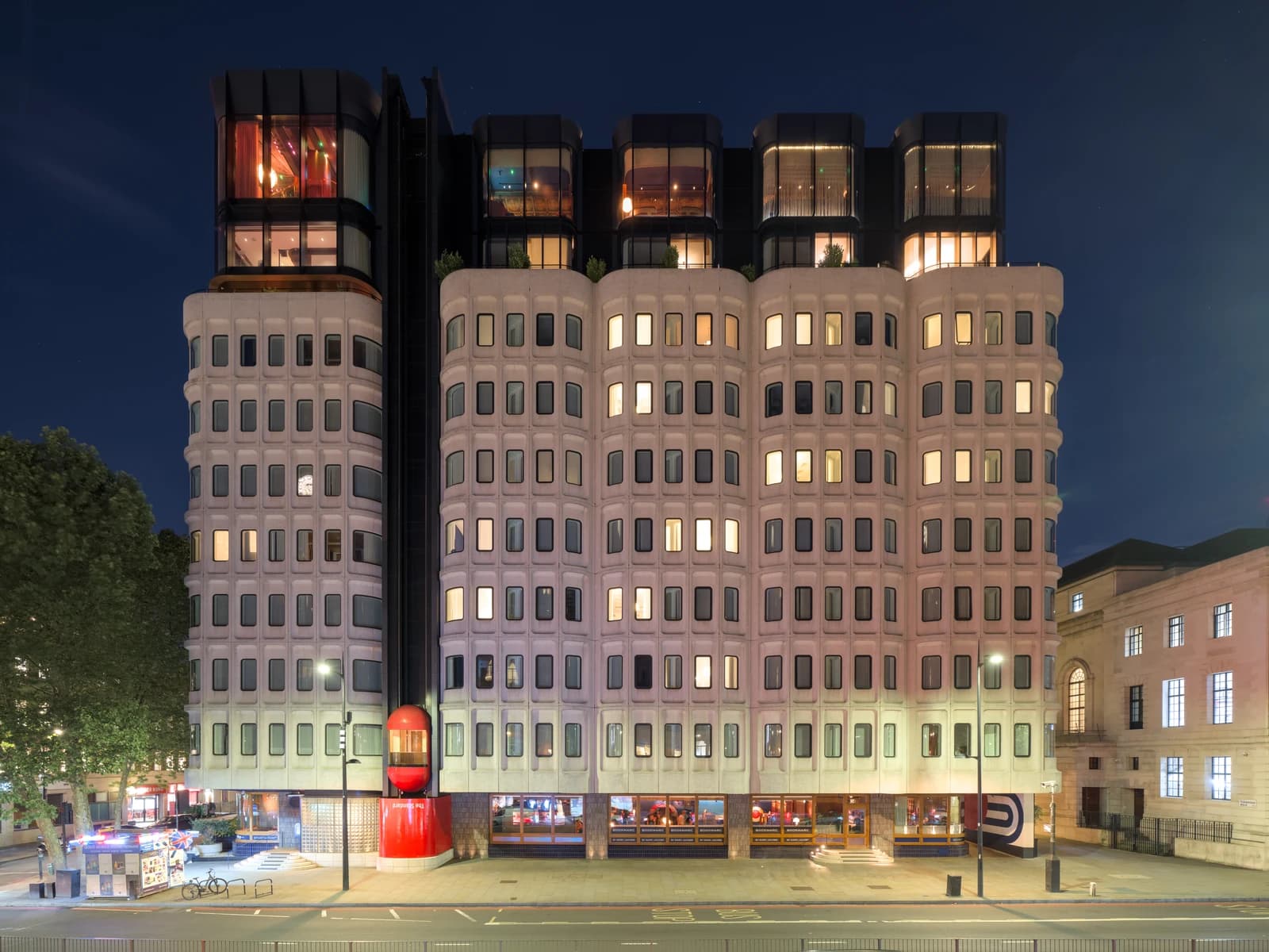 The Standard London hotel, Camden Town Hall Annexe facade at night.