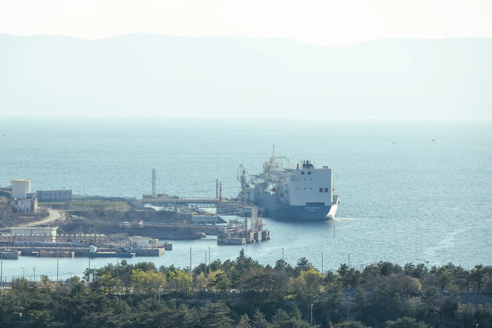 Oil tanker, gas tanker in the high sea Refinery Industry cargo ship docked at port.