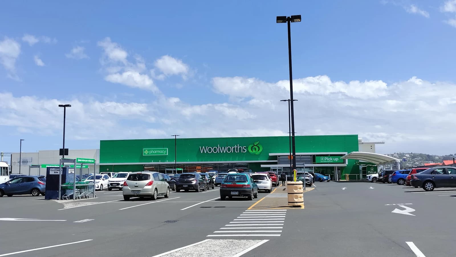 Woolworths supermarket building and parking lot in South Dunedin, New Zealand.
