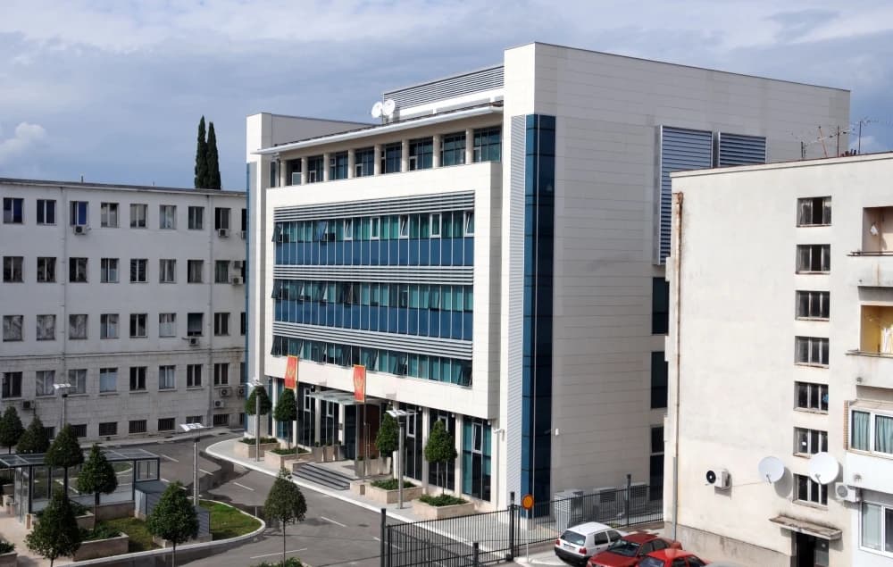 Building of the Government of Montenegro, with flags hanging near the entrance.
