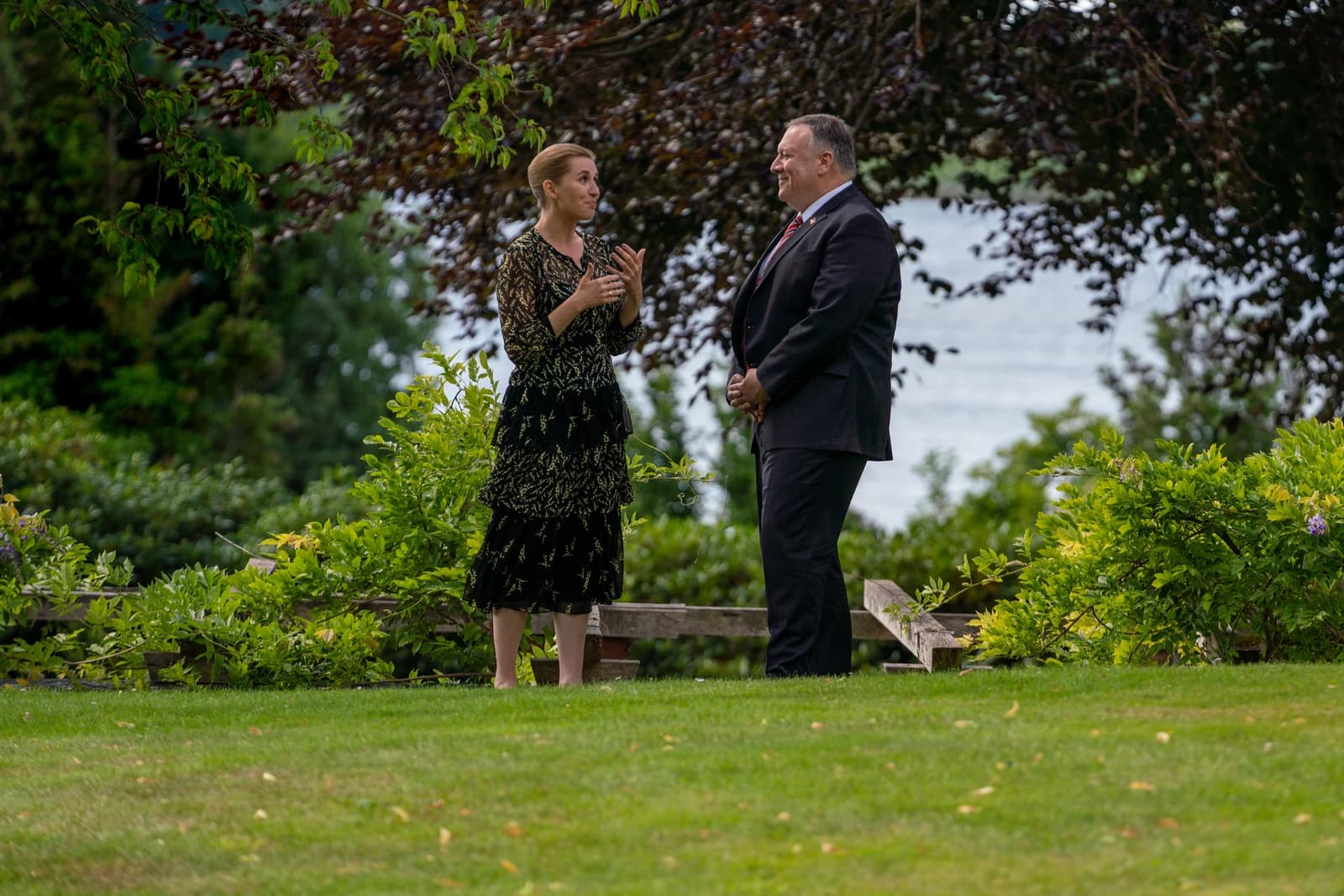 Mike Pompeo, US Secretary of State, and Mette Frederiksen, Danish Prime Minister, speaking outdoors.