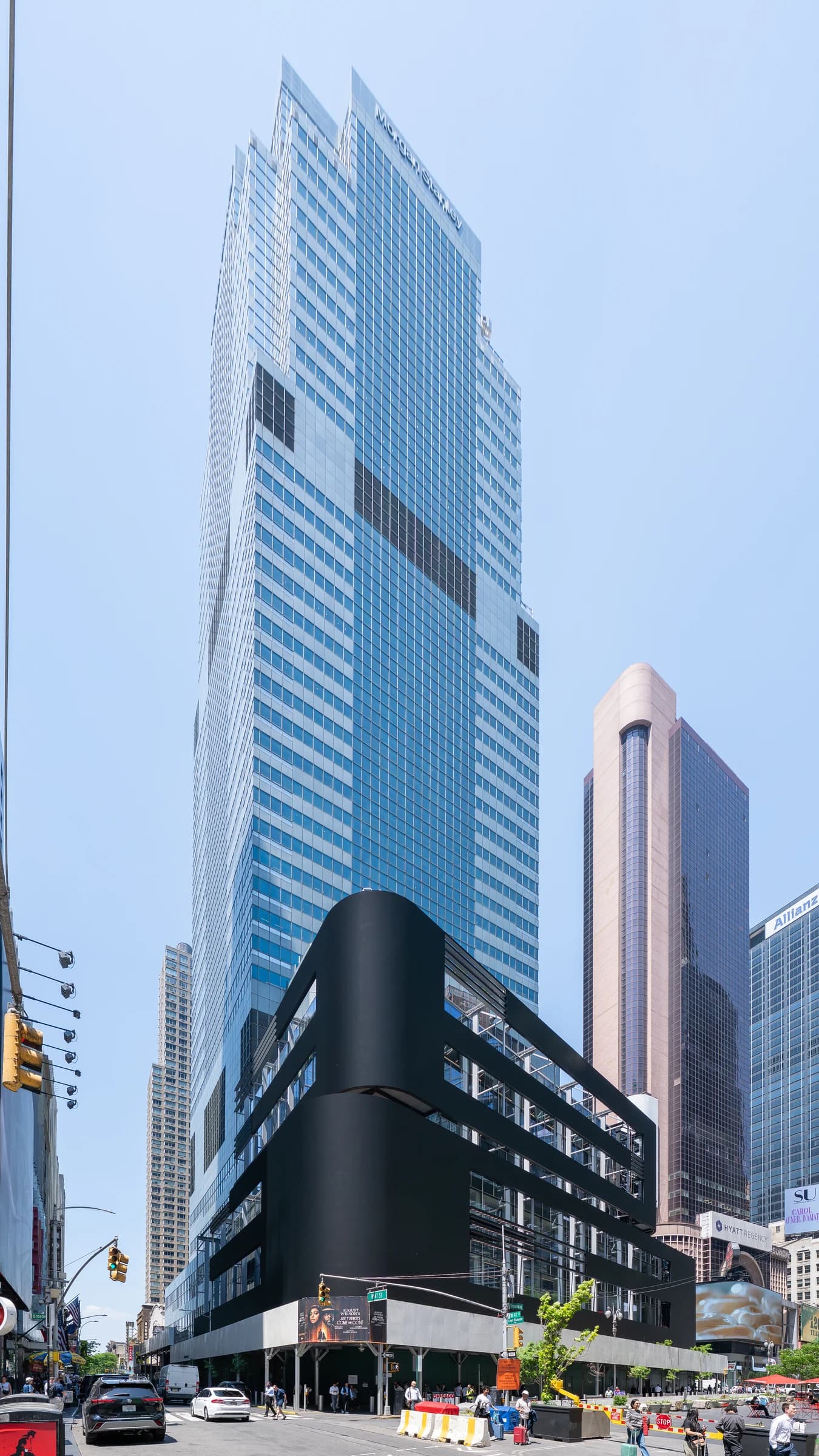 The Morgan Stanley Building at 1585 Broadway, a tall skyscraper with reflective windows.