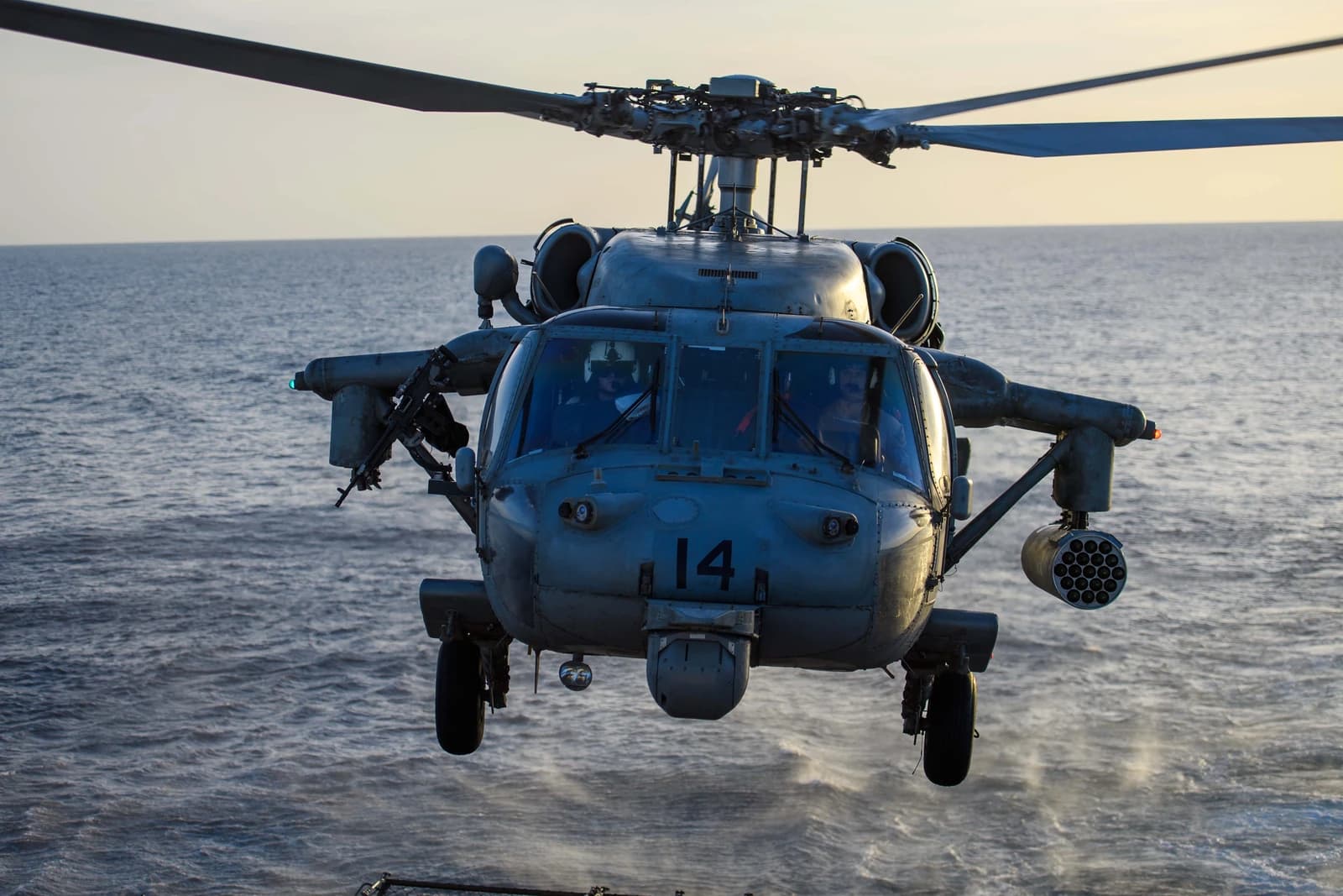 A US Navy MH-60R Seahawk helicopter hovers over the Red Sea.