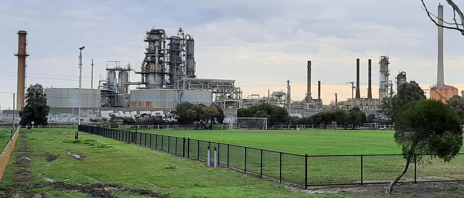 Altona Oil Refinery, Victoria, Australia, complex industrial structures with smokestacks.