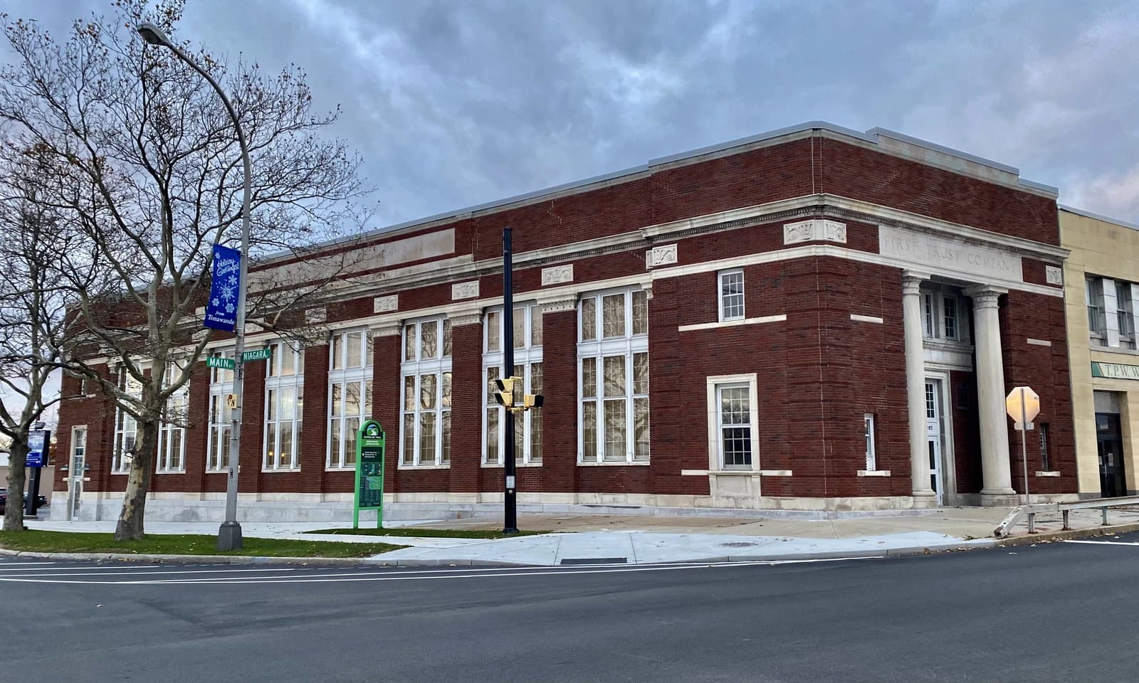 Former First Trust Company building in Tonawanda, New York, on a cloudy day.