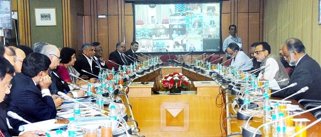 Dr. Hasmukh Adhia, Secretary of Department of Financial Services, meeting bank and government officials.