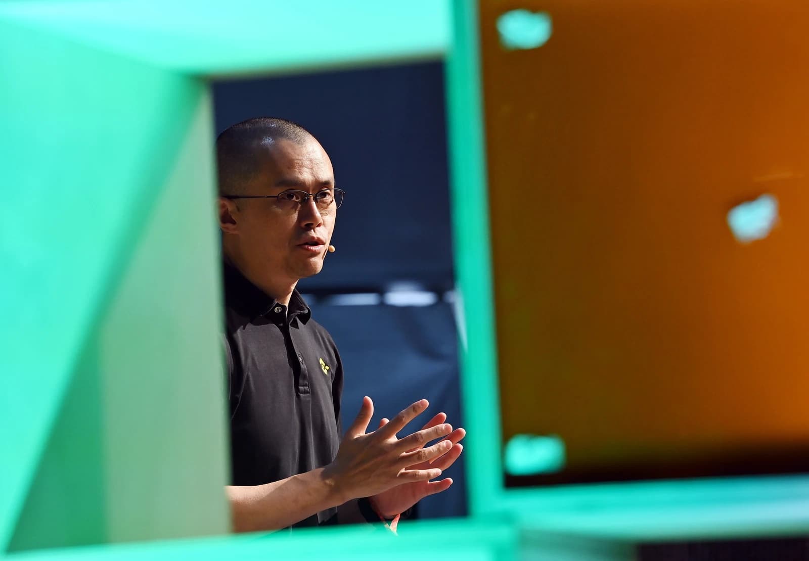 Changpeng Zhao, CEO of Binance, speaking at an event.