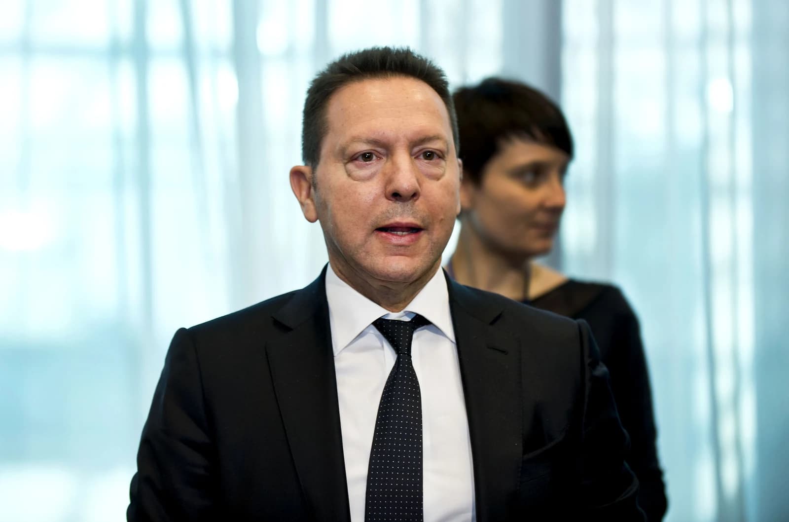 Ioannis Stournaras, Governor of the Bank of Greece, looking forward indoors.