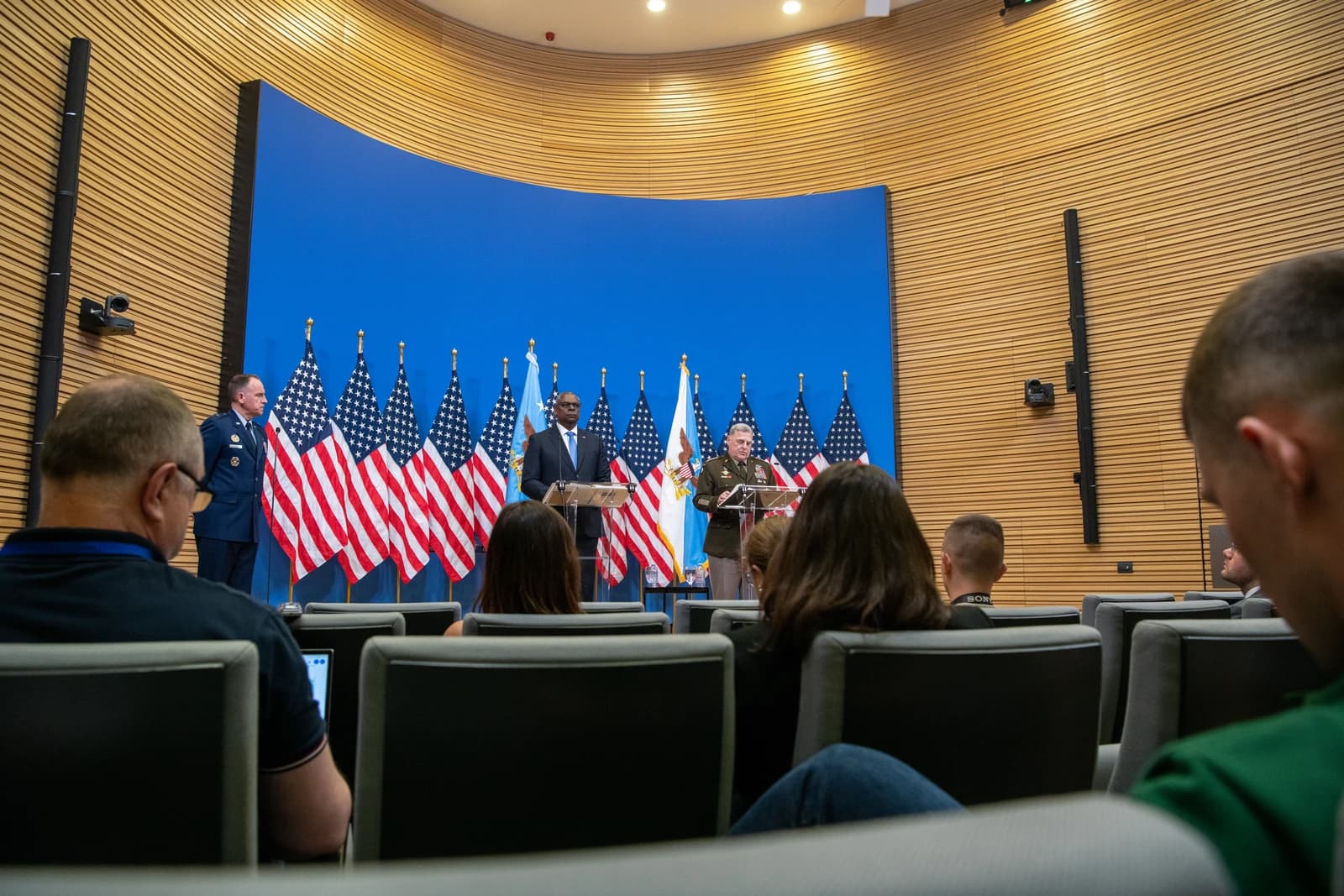 General Mark Milley and Secretary of Defense Lloyd Austin speaking at NATO Headquarters.