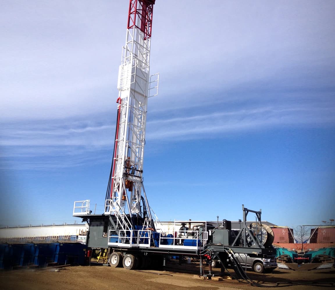 Quintera Rig 5 equipment standing under a clear blue sky.