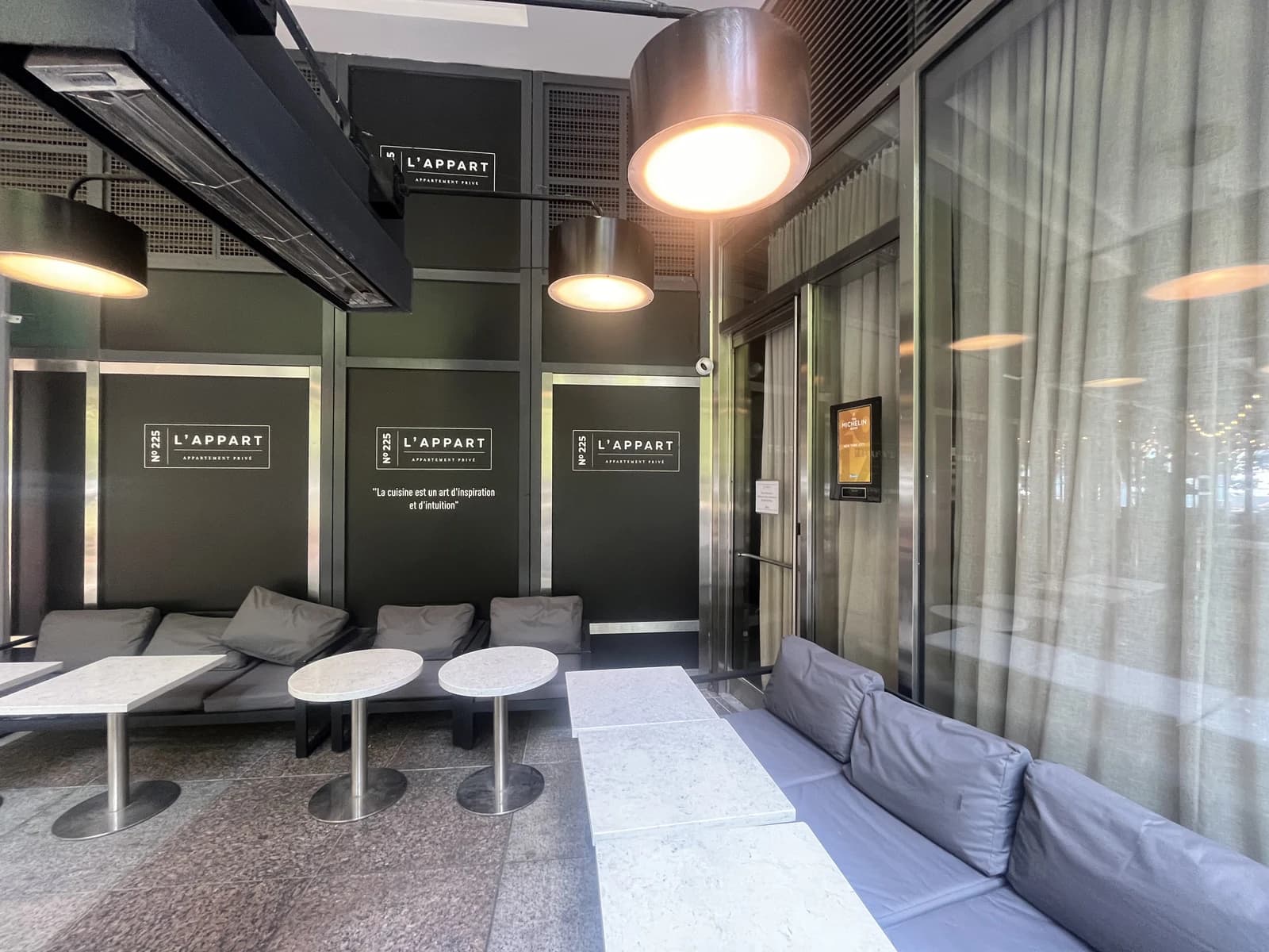 Exterior seating area of L'Appart NYC restaurant in New York City.