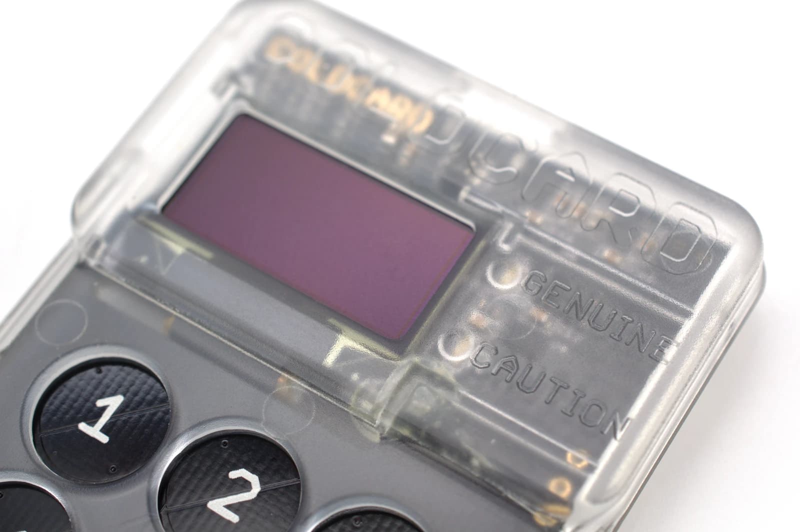 Close-up of a Coinkite Coldcard Hardware Wallet device with a clear casing.