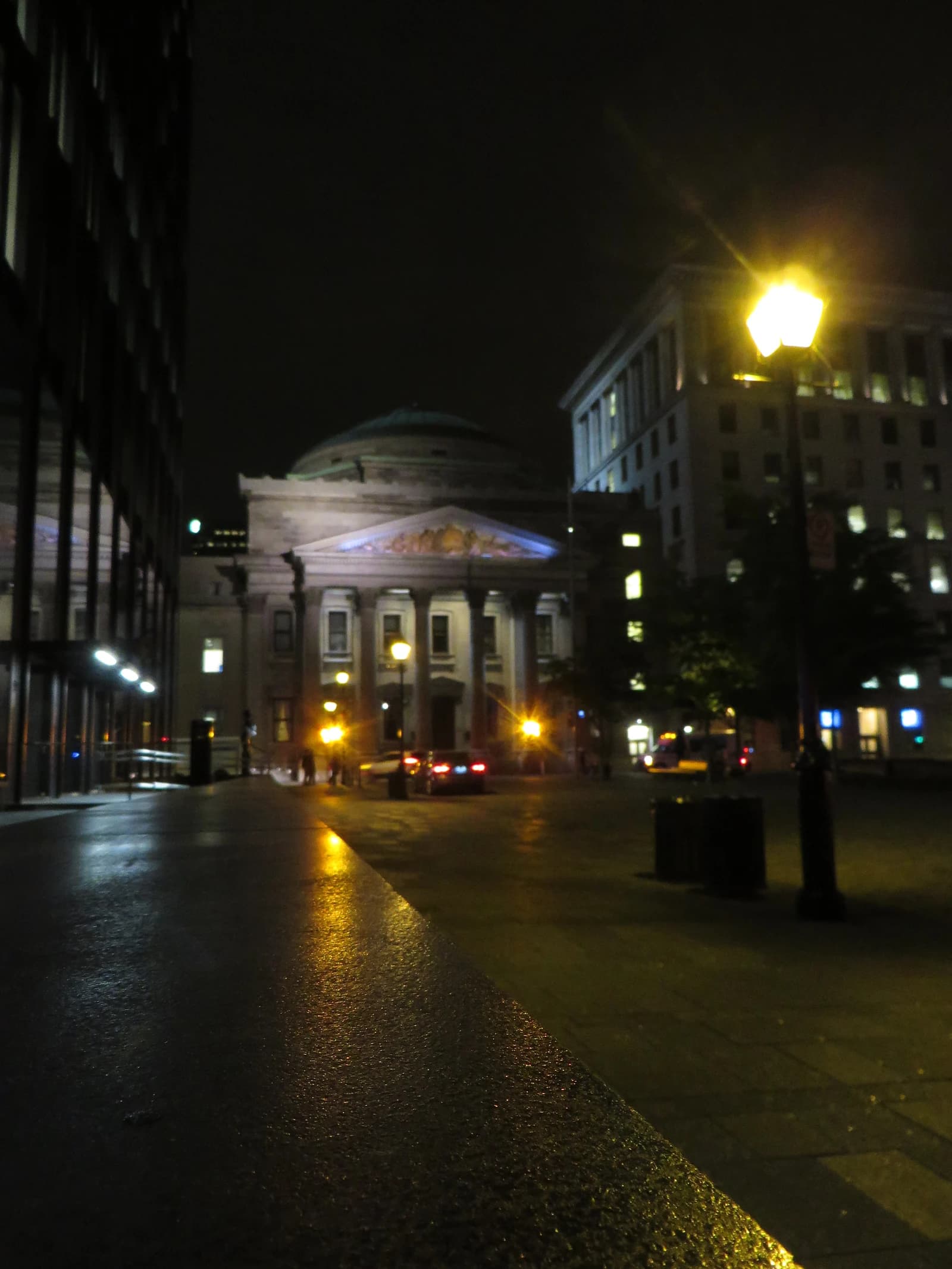 Bank of Montreal's Head Office building lit up at night in Montreal, Quebec.