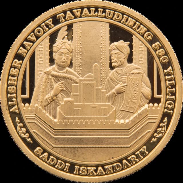 Gold coin showing two historical figures and a city scene.