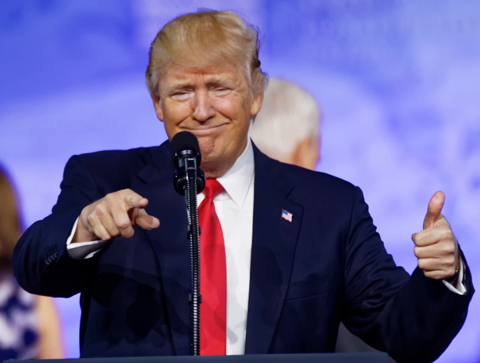 Donald Trump, President of the United States, speaking at a podium.