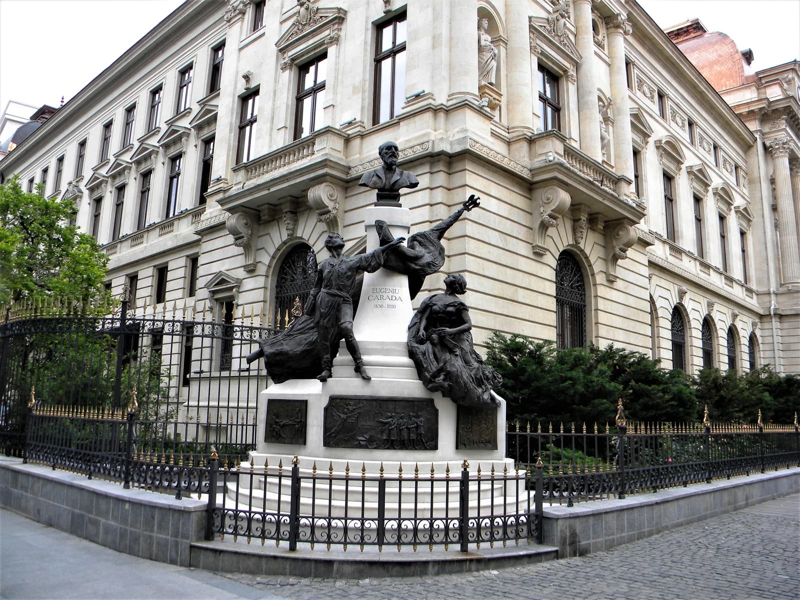 Statue of Eugeniu Carada in front of the National Bank of Romania building.