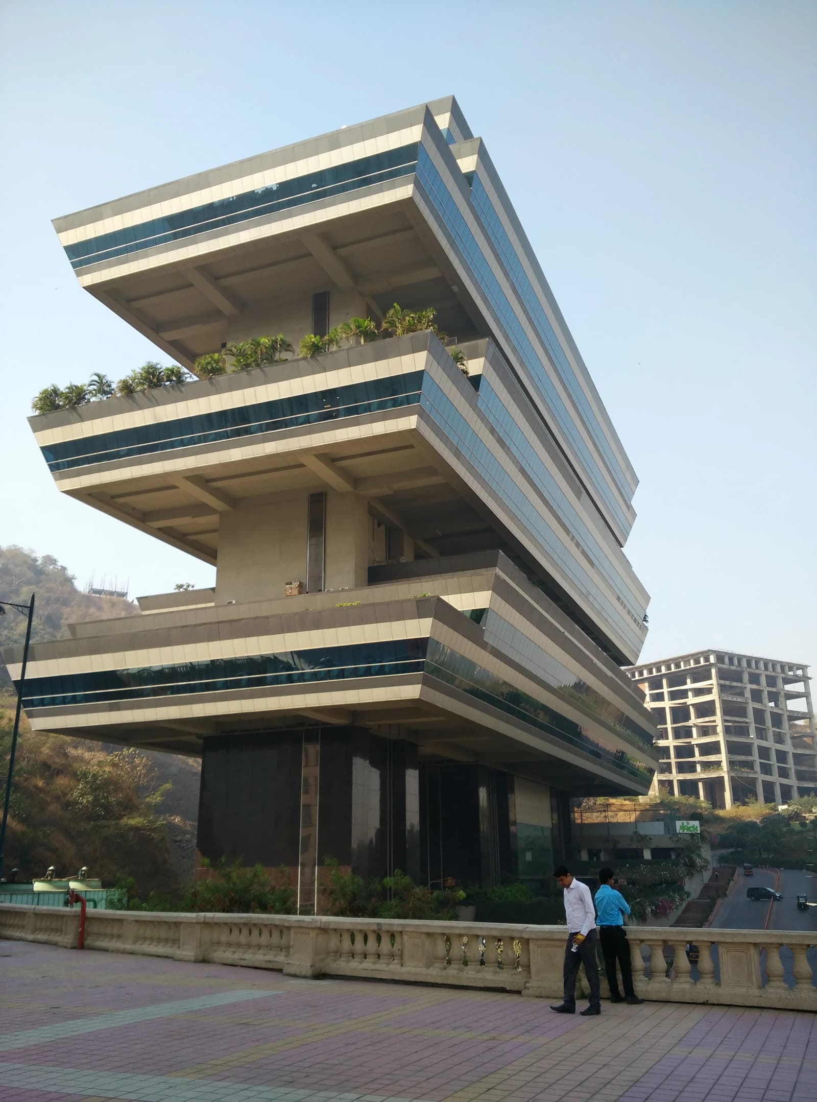 Exterior view of Supreme Business Park, a modern office building with multiple cantilevered floors in Powai, Mumbai.