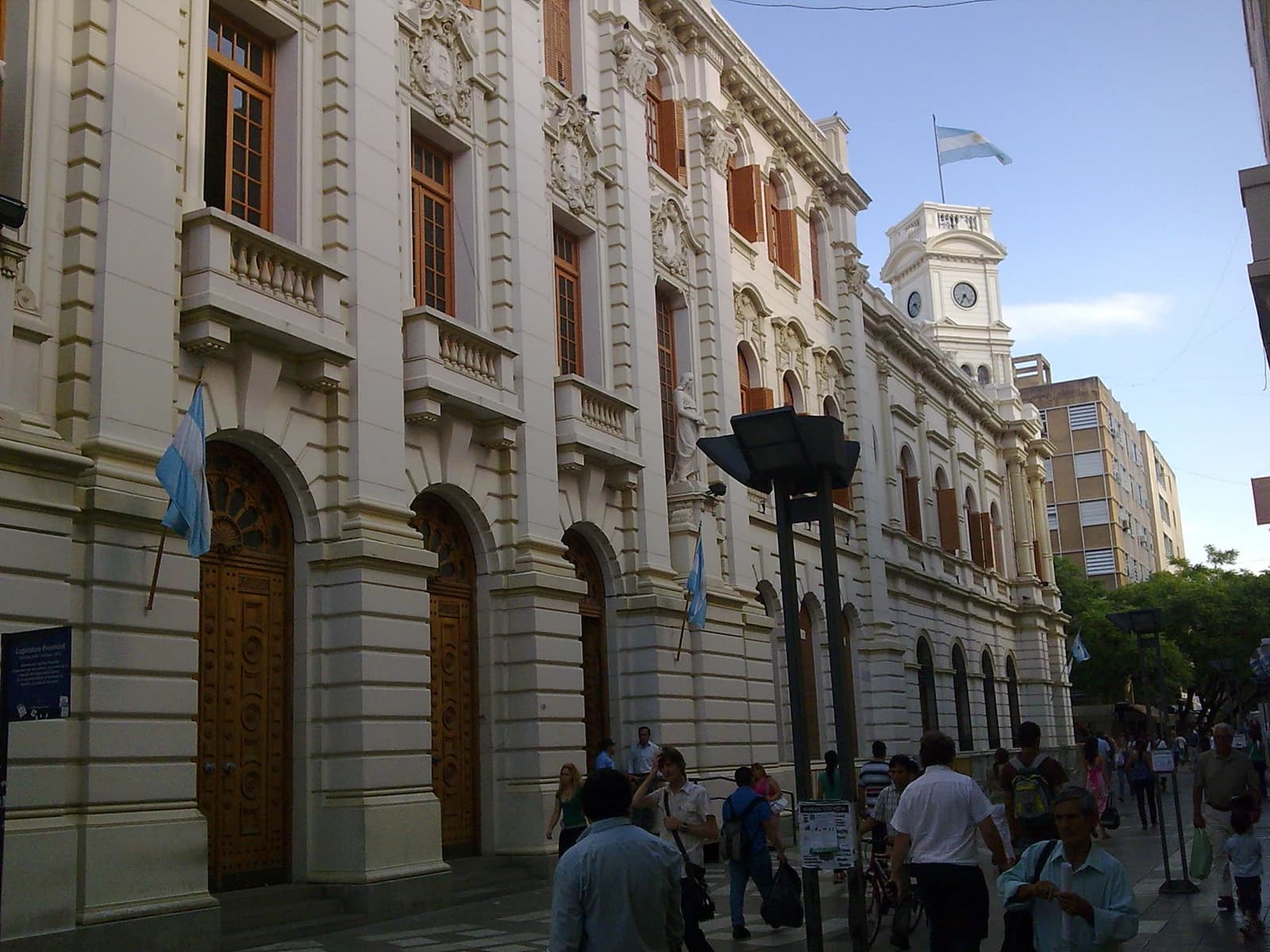 Exterior of the Legislatura de Córdoba building featuring architectural details and a clock tower.