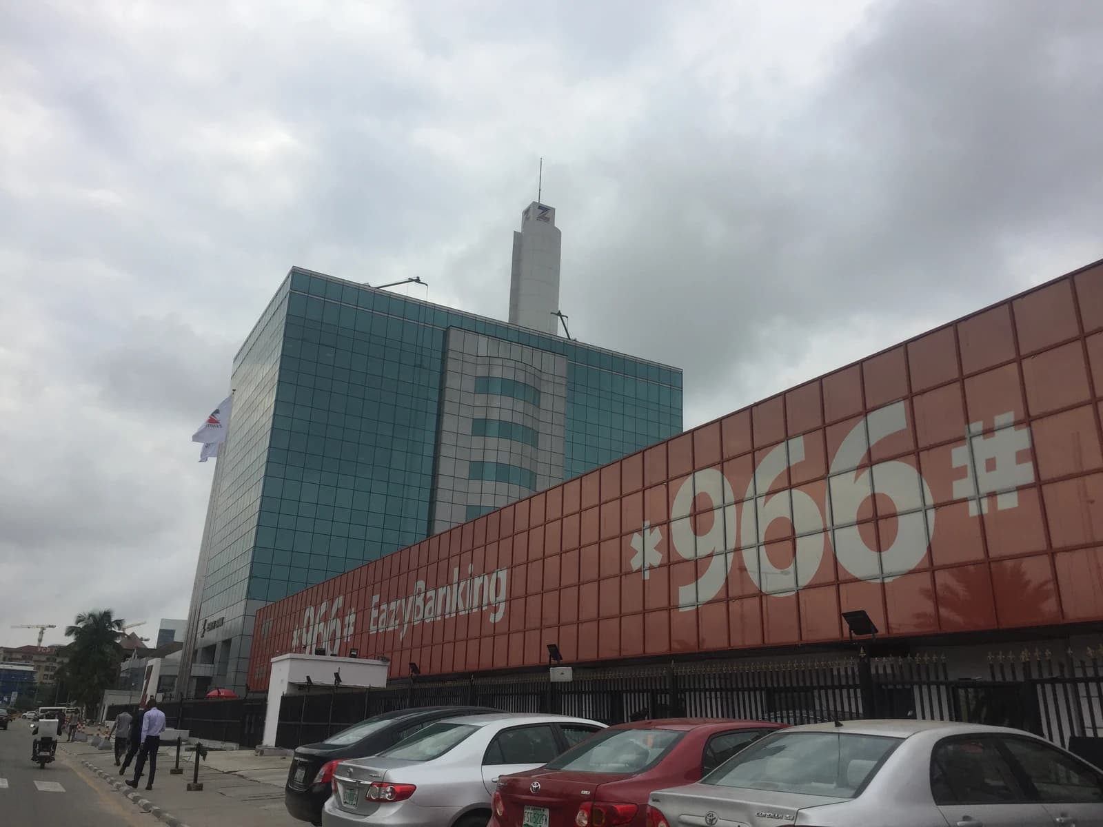 Zenith Bank headquarters building in Lagos on a cloudy day.
