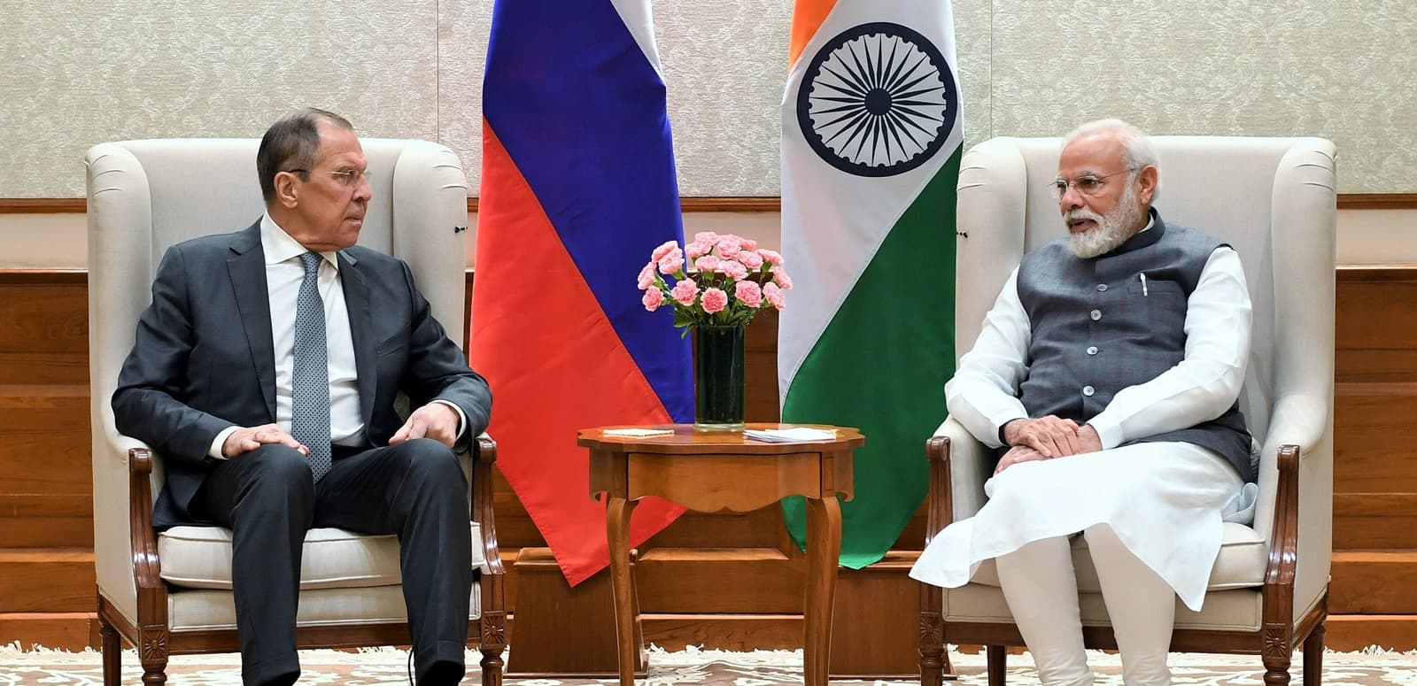 Sergey Lavrov, Russia's Foreign Affairs Minister, and Narendra Modi, India's Prime Minister, seated during a meeting.