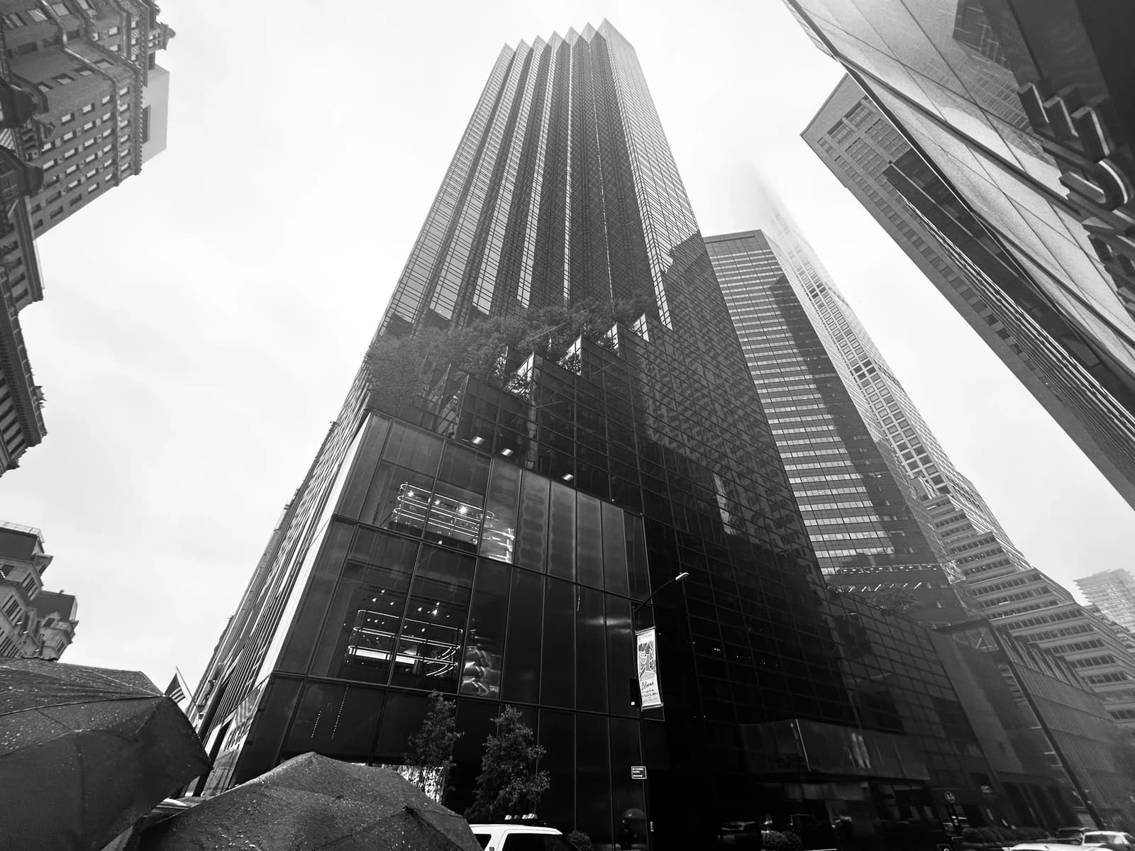 Trump Tower, a skyscraper in New York City, shown in black and white.