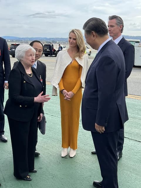 Janet Yellen, US Treasury Secretary, speaks with Chinese President Xi Jinping on an tarmac.