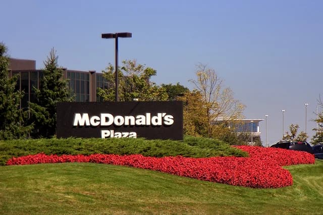 McDonald's Plaza sign at the entrance to a corporate campus in Oak Brook, Illinois.