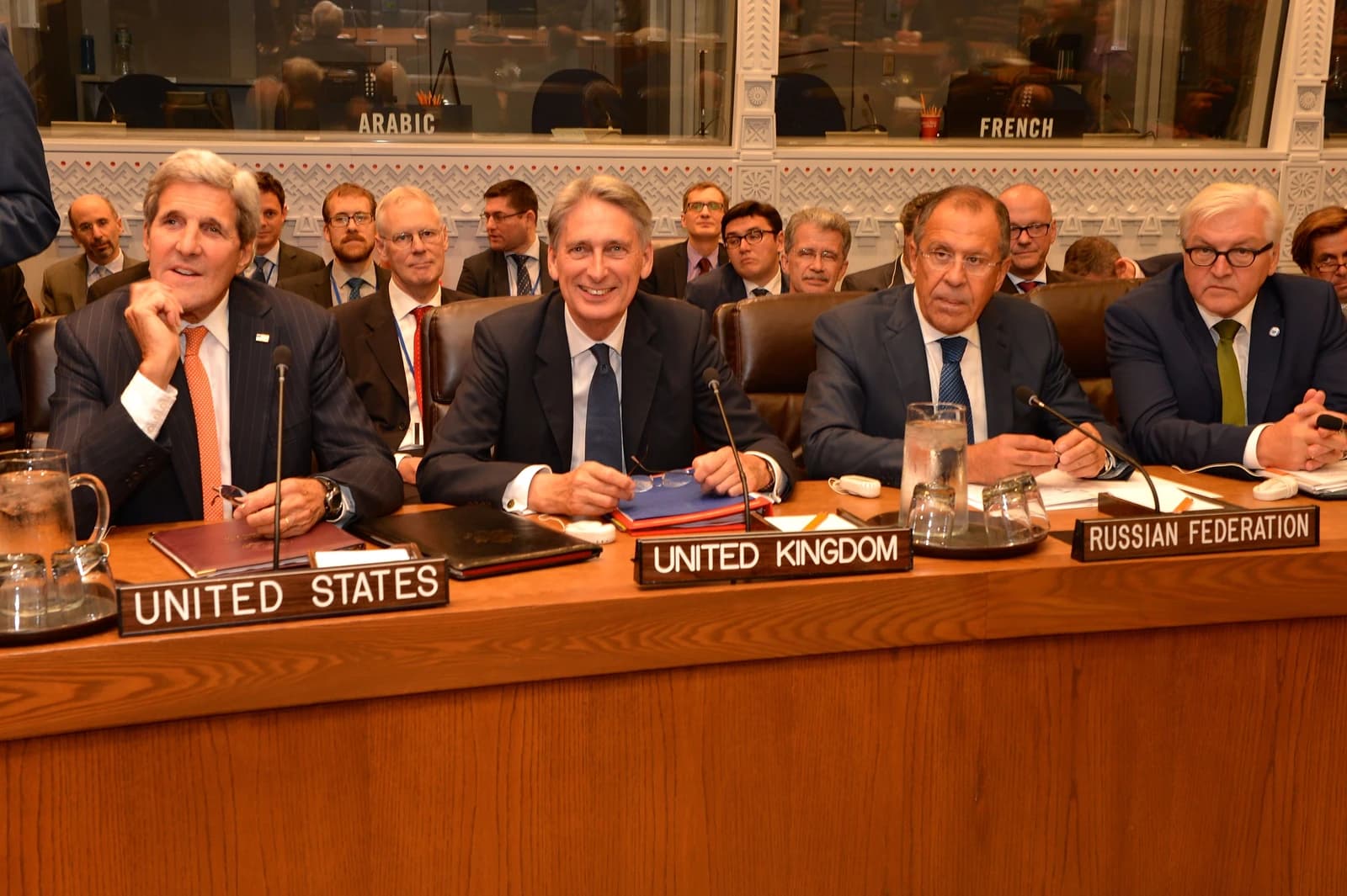 Sergey Lavrov, Russia's Foreign Minister, seated at a table with other officials.