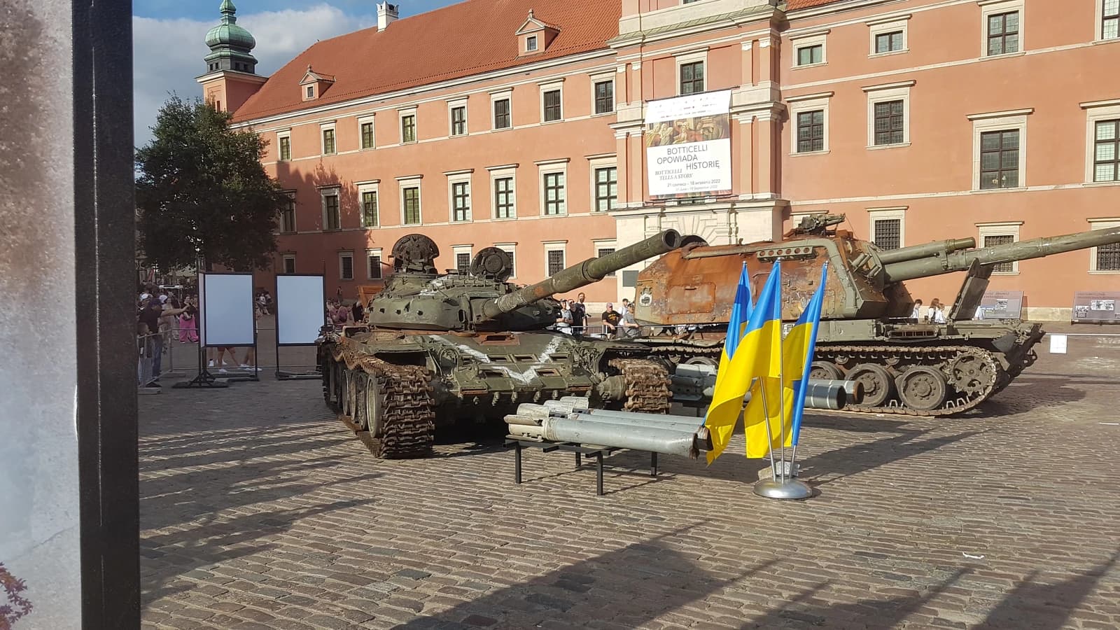 Destroyed Russian T-72B tank and self-propelled gun displayed in Castle Square, Warsaw.