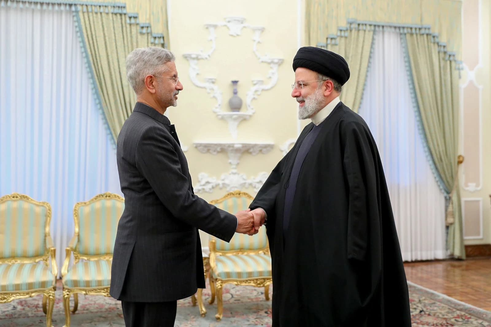S. Jaishankar, External Affairs Minister, shaking hands with Ebrahim Raisi, President of Iran.