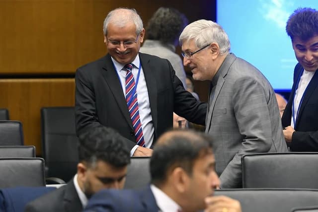 Men attending the 1696th Board of Governors meeting of the IAEA in Vienna, Austria.