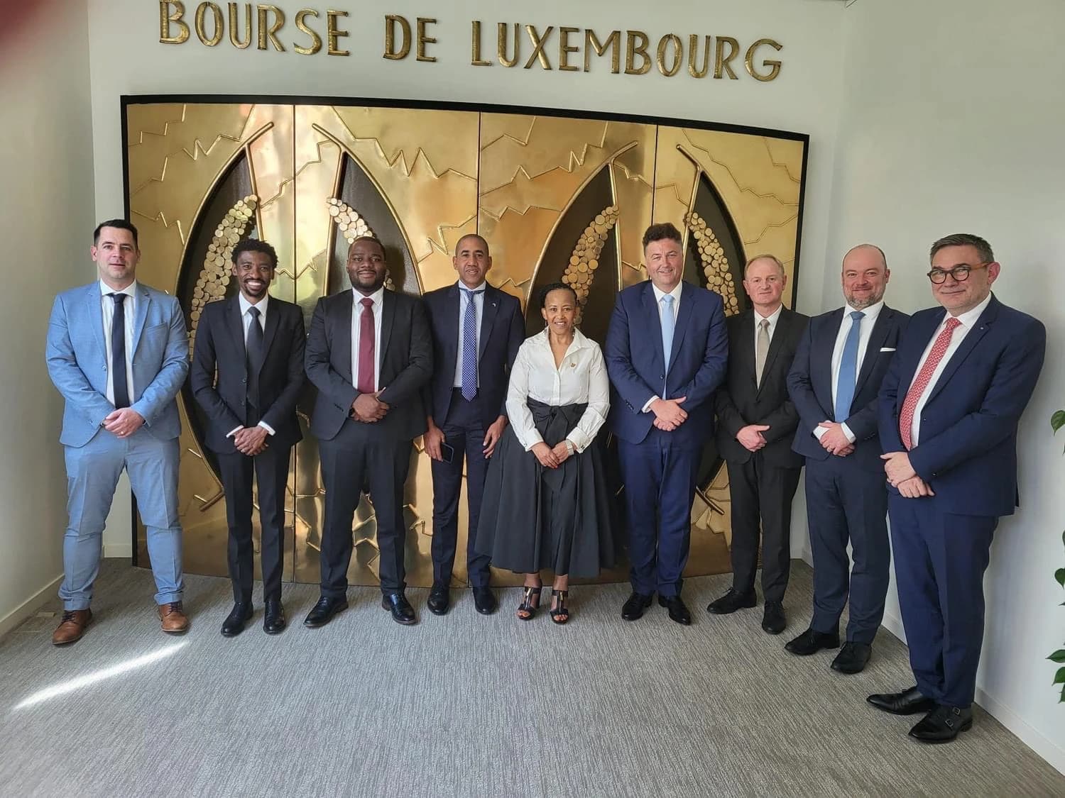 Executives and officials gathered at the Luxembourg Stock Exchange for Suppple Group Plc listing ceremony.