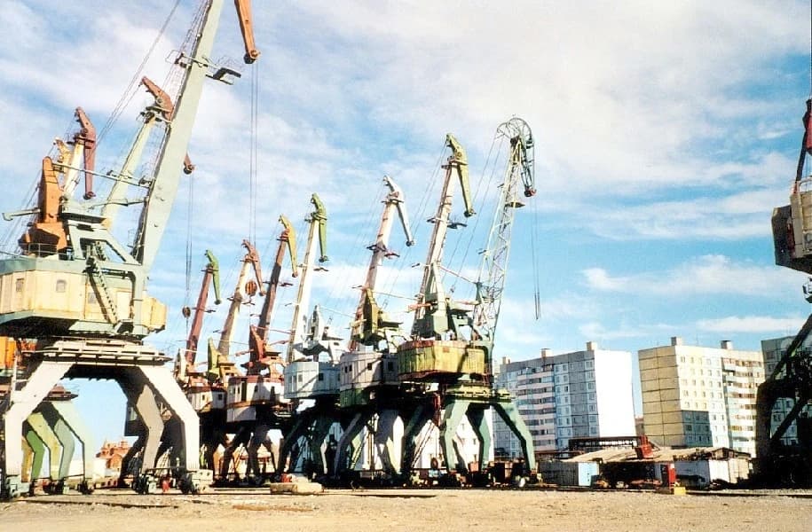 Cranes in the port of Dudinka, Russia, used for cargo operations.
