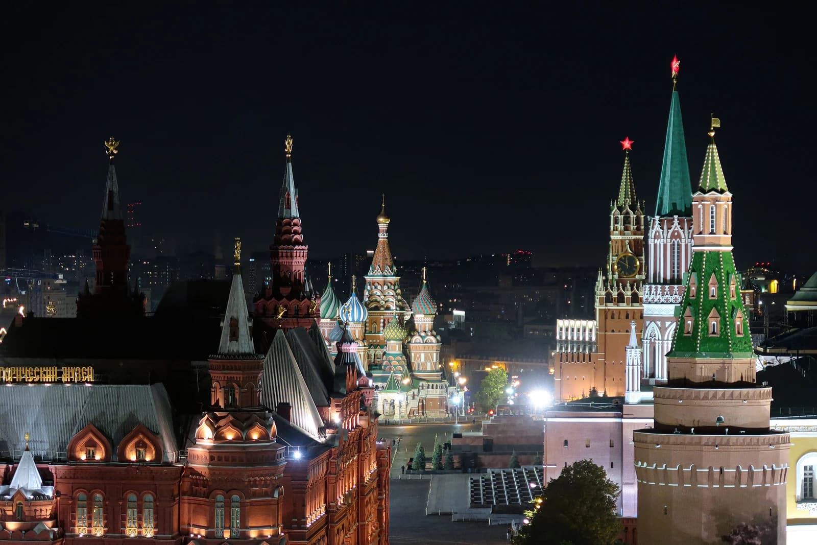 Night view of the Moscow Kremlin and Saint Basil's Cathedral illuminated.