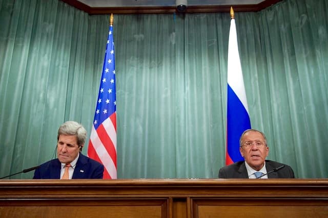 Russian Foreign Minister Sergey Lavrov addresses reporters at a press conference.