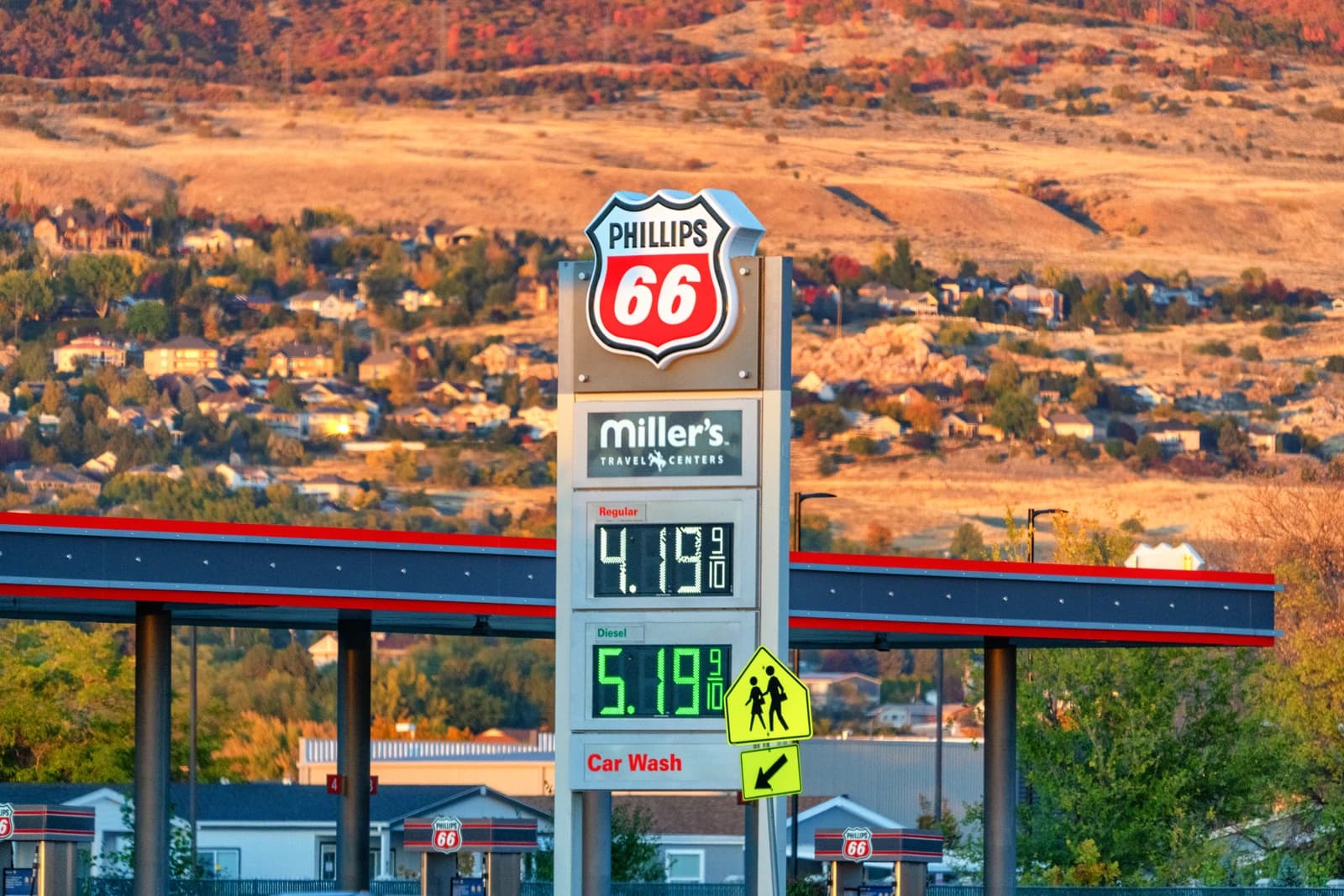 Phillips 66 gas station sign in Salt Lake City showing current fuel prices.