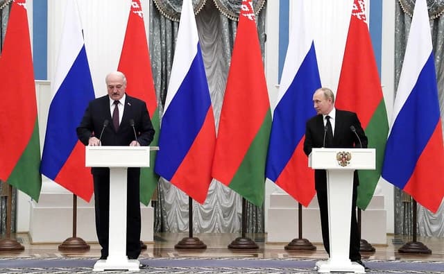 Alexander Lukashenka, President of Belarus, and Vladimir Putin, President of Russia, at podiums.