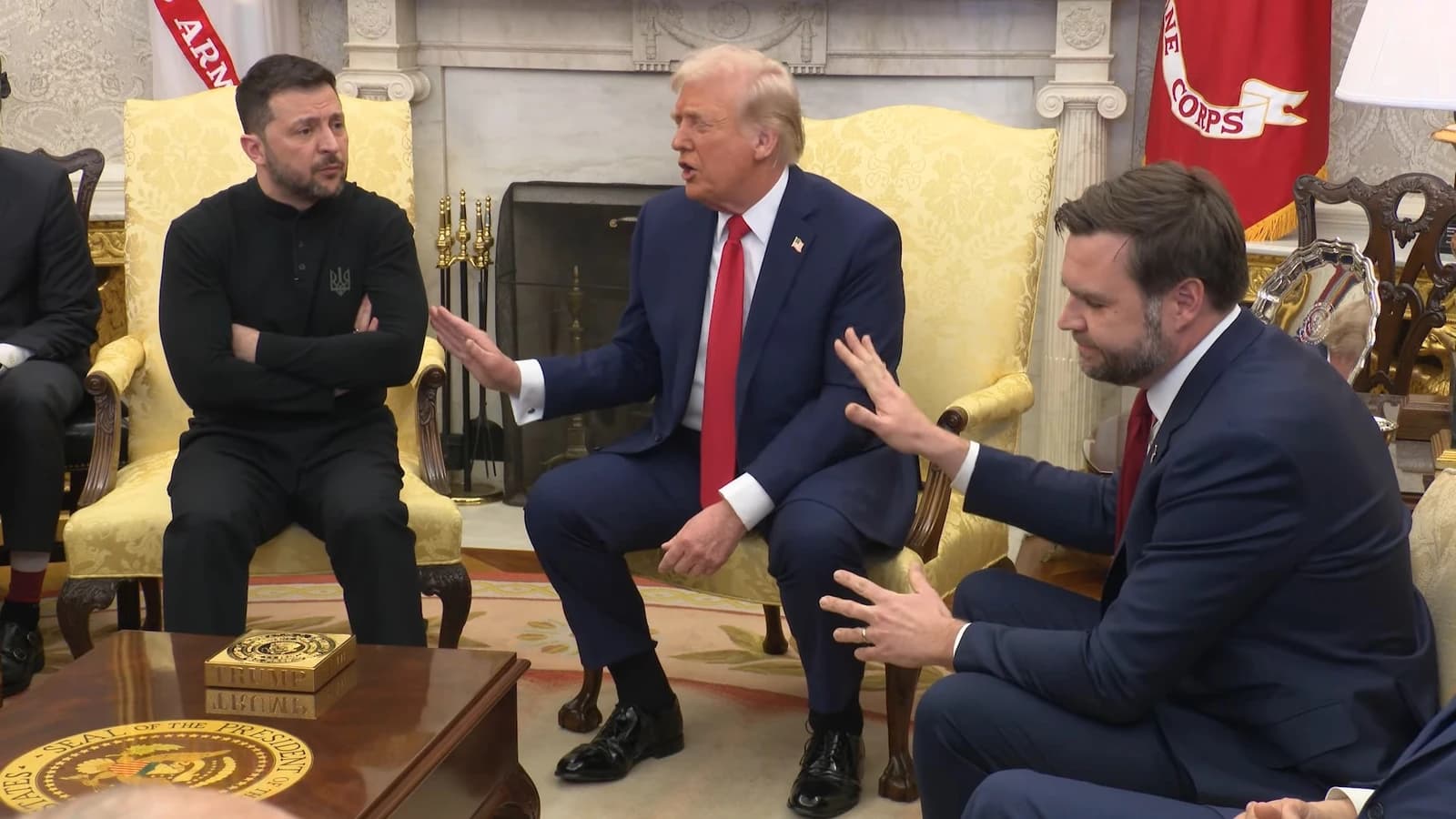Donald Trump, former U.S. President, speaks with Volodymyr Zelenskyy, Ukrainian President, in a room.
