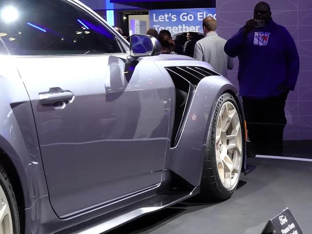 2024 Ford Mustang GTD, showing front fender and wheel at an event.