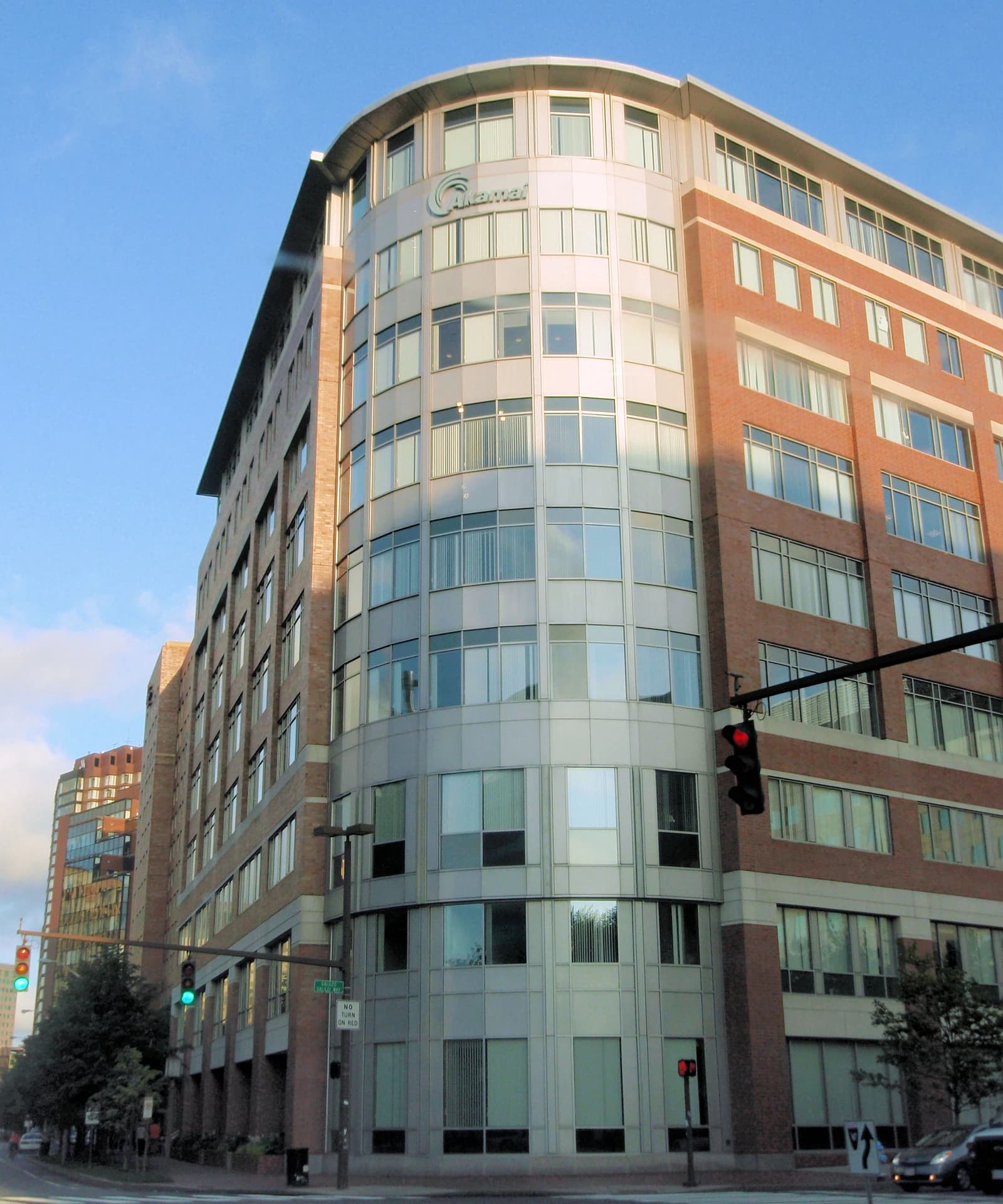Akamai Technologies headquarters building, a multi-story structure with brick and glass facades.