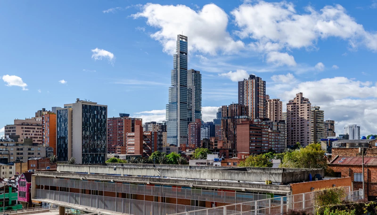 Overview of the Bogotá, Colombia city skyline with multiple tall buildings.