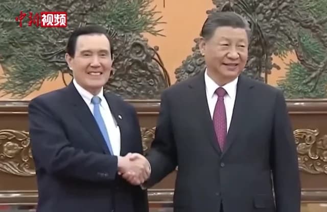 Xi Jinping, President of China, shaking hands with Ma Ying-jeou, former President of Taiwan.