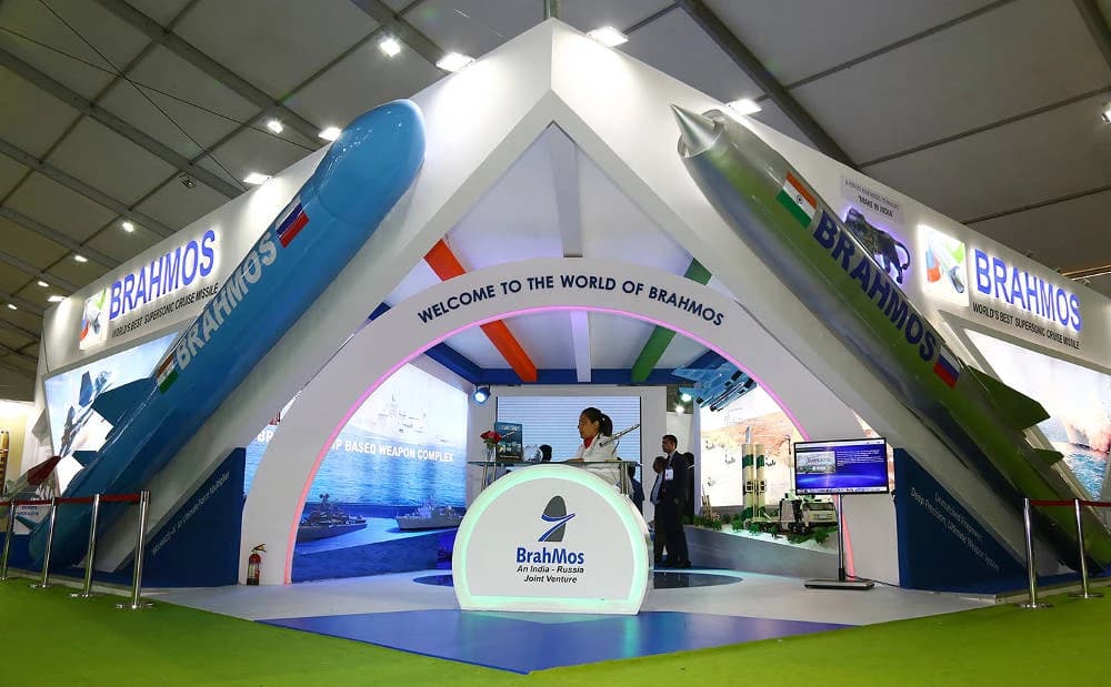 BrahMos Aerospace exhibition stall at Defexpo 2016 showcasing missile models.