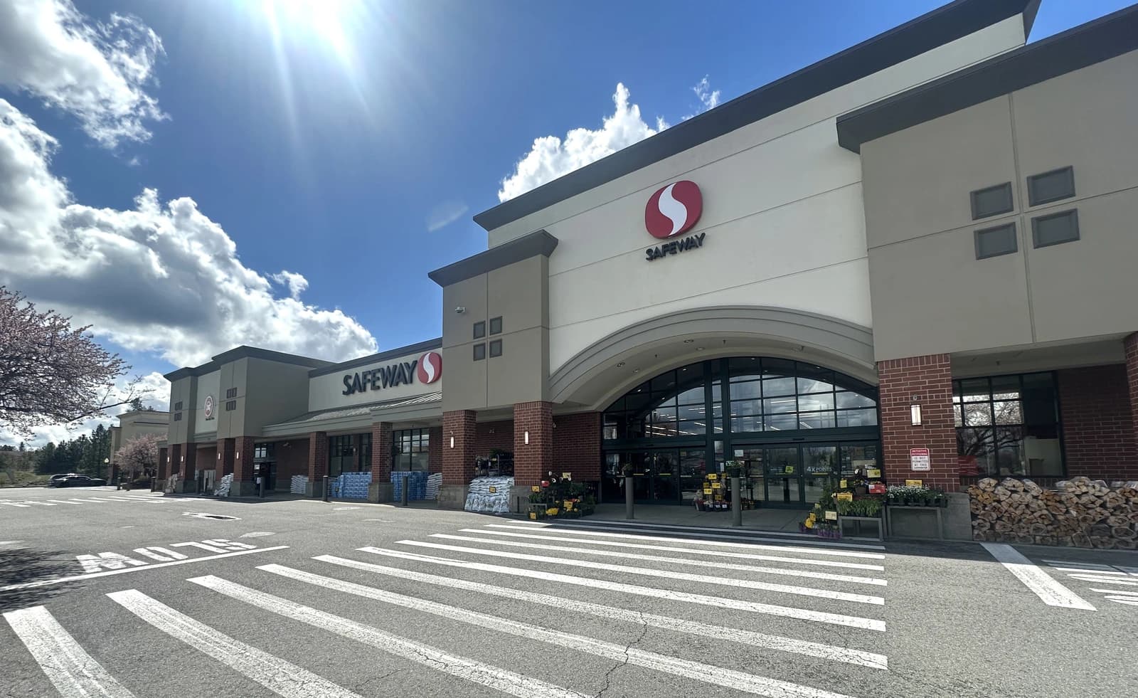 Exterior of a Safeway grocery store showing the main entrance and facade.