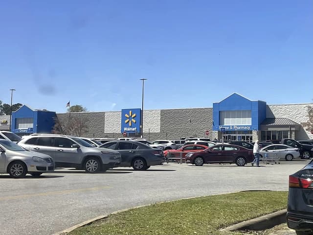 Walmart Supercenter building with cars in the parking lot in Bainbridge, Georgia.