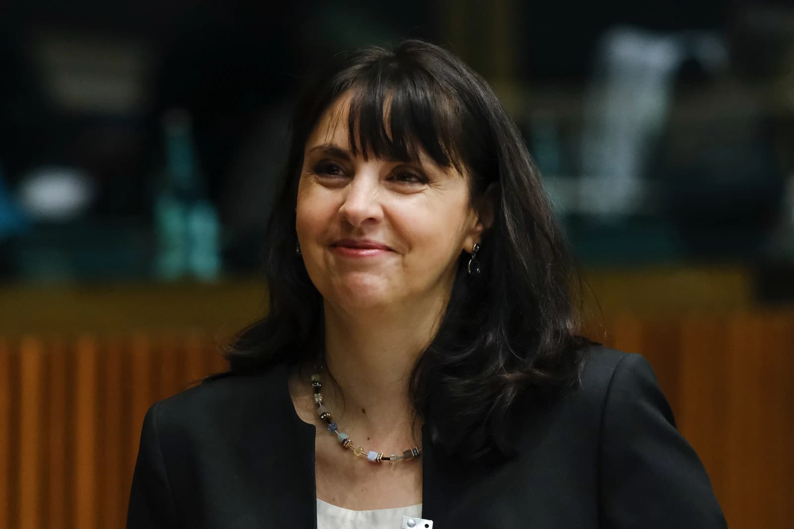Nataliya Efremova, Social Affairs Minister, smiles during an EPSCO meeting.
