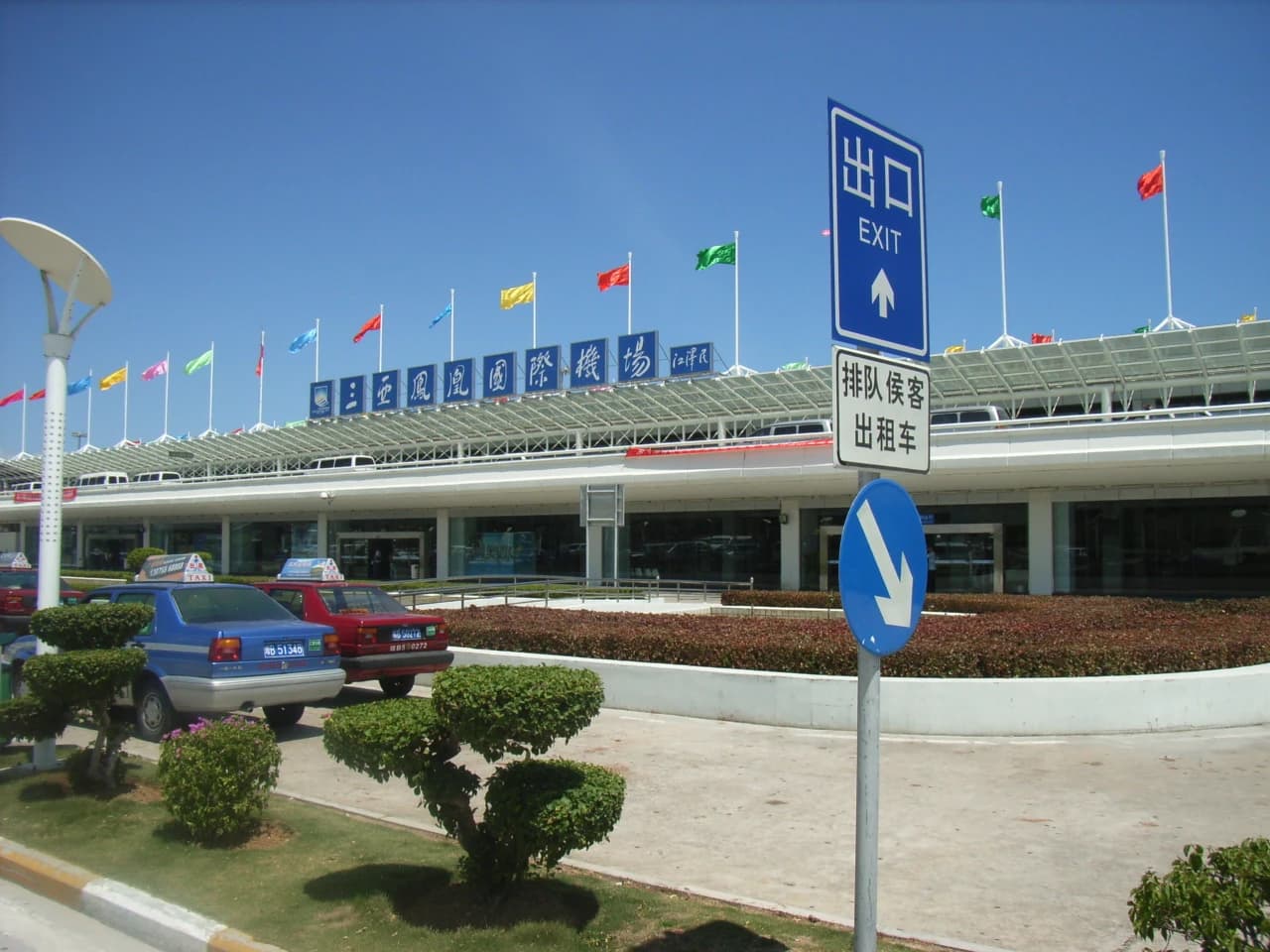 Taxis parked at the taxi stand outside Sanya Phoenix International Airport terminal.